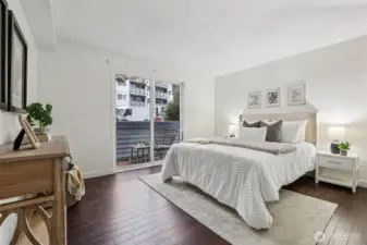 Bedroom with sliding door access to the private patio