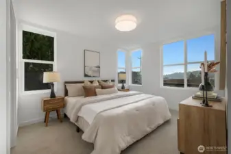 Windows offer lovely territorial view.   Photos are of model home of same floorplan. Color schemes will vary.