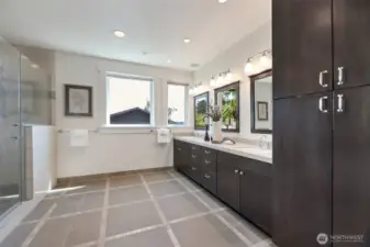 Primary en suite has everything you need as well as the laundry