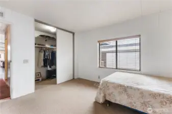 The primary bedroom has a walk in closet