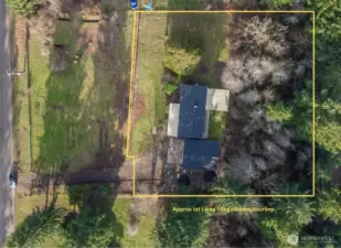 Overhead perspective showcases the expansive lot of nearly an acre, with no neighbors in the back!
