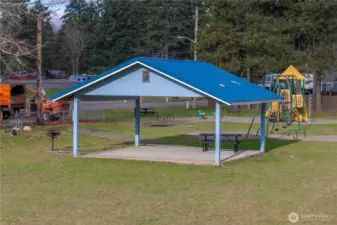 Gehrke Park features a covered picnic area and open lawns, offering a great extension of the home’s outdoor living.