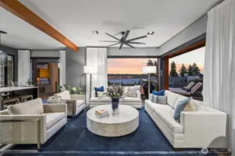 Refined luxury in every perfectly curated detail creates inviting spaces throughout.  The great room features 3 sets of Fleetwood pocket doors allowing the walls to fully open and bring the outdoors in.