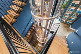 A masterpiece of modern engineering. This 3-story glass elevator is the stunning centerpiece of a custom Hoppet Design home in downtown Gig Harbor. A fortress of design with a soul of silk.