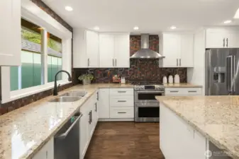 Fresh trim and craftsman doors, and LVP flooring throughout. Newer Milgard Tuscany vinyl windows, two-way blinds, newer 95% efficiency furnace and water heater. Newer outlets, fixtures and recessed lighting.