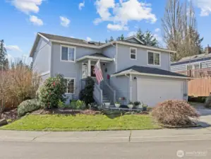 This extremely well-maintained home on a sun-drenched corner lot awaits its next chapter.