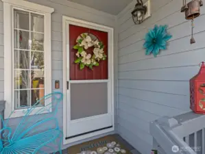 Cute front porch greets you as you walk up to the front door.