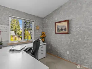 Just off the kitchen is the 1st bedroom, which is great for a home office.