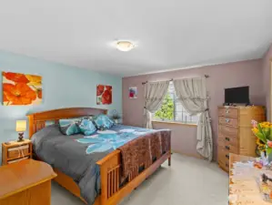 Rounding out the main floor is the primary suite with great walk in closet.