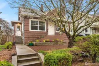 Charming 3 bed/1.75 bath home filled with natural light and west-facing views of the Ship Canal & Olympic Mountains.