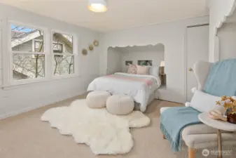 One of two upstairs light filled bedrooms.