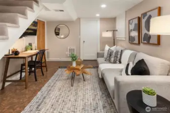 Huge storage area behind white door for gear or future expansion. This daylight lower level offers great flexible space for a rec room, guest suite, or work-from-home setup.