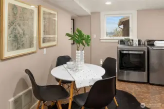 Lower level laundry area and kitchenette great space for great flexible space for a rec room, guest suite, or work-from-home setup.