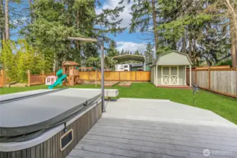 Hot tub, trex deck, storage shed with power