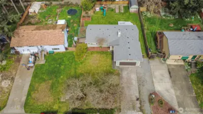 Rambler in the middle with newer gray roof
