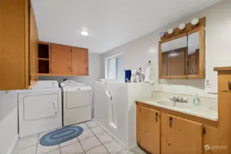 Main floor bathroom with laundry.