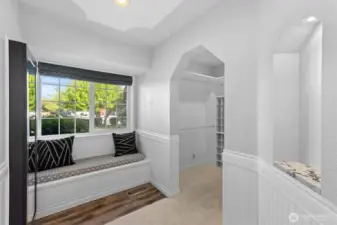 Sitting area with built in jewelry cabinet