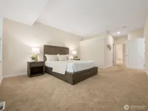 Spacious primary suite acccomodates a king sized bed, multiple dressers and even a big cozy reading chair, if you wish!