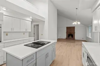New cabinets, granite tops and faucets, with vaulted ceiling above