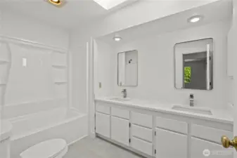 Double vanity, upstairs hall bath.
