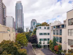 Deeded parking space (#13), rare for city living.