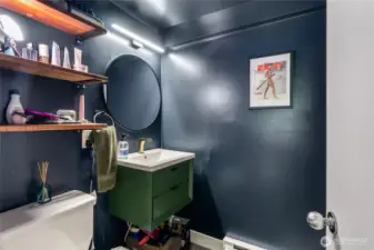 Bathroom refreshed with new flooring + modern updates.
