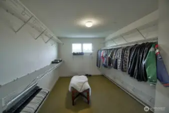 Ideal primary closet with plenty of room.