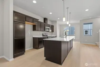 Photographs are for illustrative purposes only. Features, finishes, interior/exterior colors, landscaping and floorplan shown may vary from actual homes built.