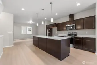 Photographs are for illustrative purposes only. Features, finishes, interior/exterior colors, landscaping and floorplan shown may vary from actual homes built.