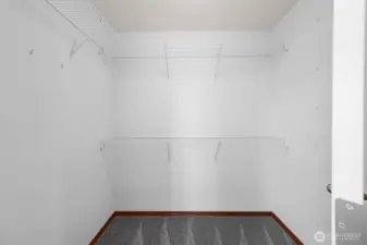Primary walk-in closet.