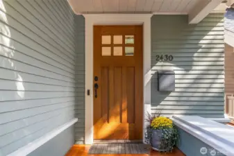 The covered front porch welcomes you  home!