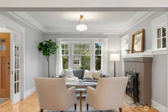 The living room enjoys nice natural light  through the large west facing front window.