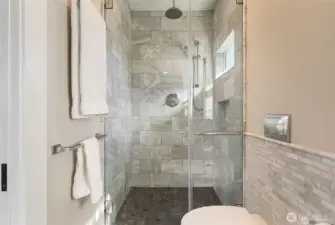 The walk-in shower in the primary bath.
