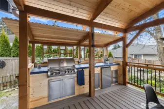 Built-in BBQ area with fridge.