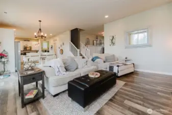 Family room with fireplace and tons of natural light