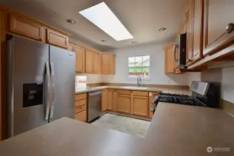 Kitchen with new stainless steel appliances