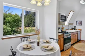 Looking into the kitchen from the dining nook - so sunny and bright!