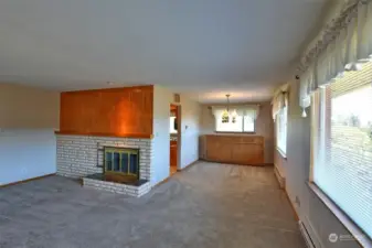 Coming through the front door, fireplace to the left, formal dining room straight ahead