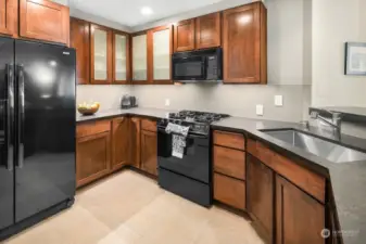 Chef's kitchen with good storage space and counter spaces. On the left is the pantry.