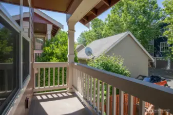 Enjoy a peaceful morning coffee or evening unwind on the covered balcony off the bedroom.