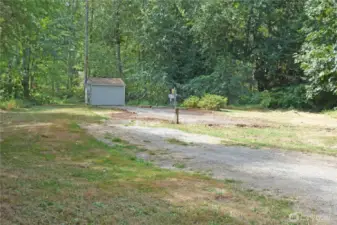 Underground utilities (power, cable, water and phone). This is where a manufactured home was just removed (8/2025).