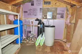 Pump house with pressure tank and softener.