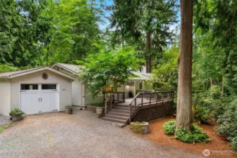 Meander down a tree-lined drive to this charming one-level rambler on .71 acres. A perfect home to start your life on Bainbridge Island.