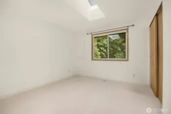 The middle bedroom can accommodate any size bed.