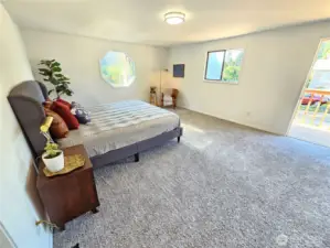 Master with door opened to the private deck.