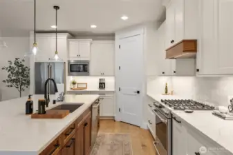 Very thoughtfully designed kitchen with a walk-in pantry.