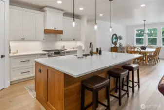 What a great entertaining space.  The end cabinets have a top hidden handle for easy access to additional storage space!