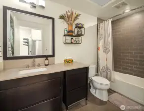 Large bathroom with extra vanity counter and cabinet space