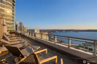 Large sky terrace with several distinct spaces to relax, BBQ, and more