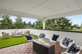This covered deck has been home buyers all time favorite. Enclose it in for more living space or enjoy it year around with the plumbed gas firetable.